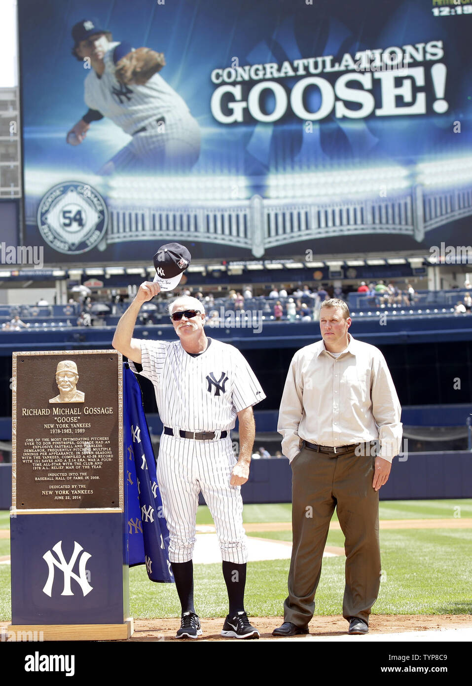 Retired New York Yankee pitcher Goose Gossage tips his cap while looking at his monument that will be placed in Monument Park at the 68th Annual Old-Timers' Day before the New York Yankees play the Baltimore Orioles at Yankee Stadium in New York City on on June 22, 2014.   UPI/John Angelillo Stock Photo