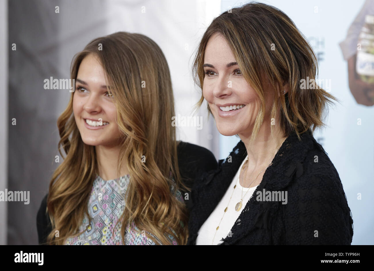 Christa Miller and Charlotte Burns arrive on the red carpet at the 'Wish I Was Here'  premiere at AMC Lincoln Square Theater in New York City on July 14, 2014. Focus Features will release Wish I Was Here in select cities on Friday, July 18th and will expand the release on Friday, July 25th.        UPI/John Angelillo Stock Photo