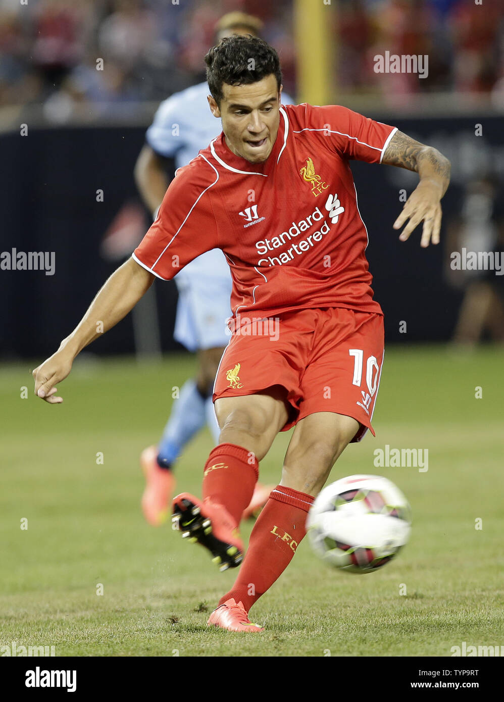 Liverpool FC Philippe Coutinho kicks the ball in the second hal against  Manchester City at the Guinness International Champions Cup at Yankee  Stadium in New York City on July 30, 2014. The