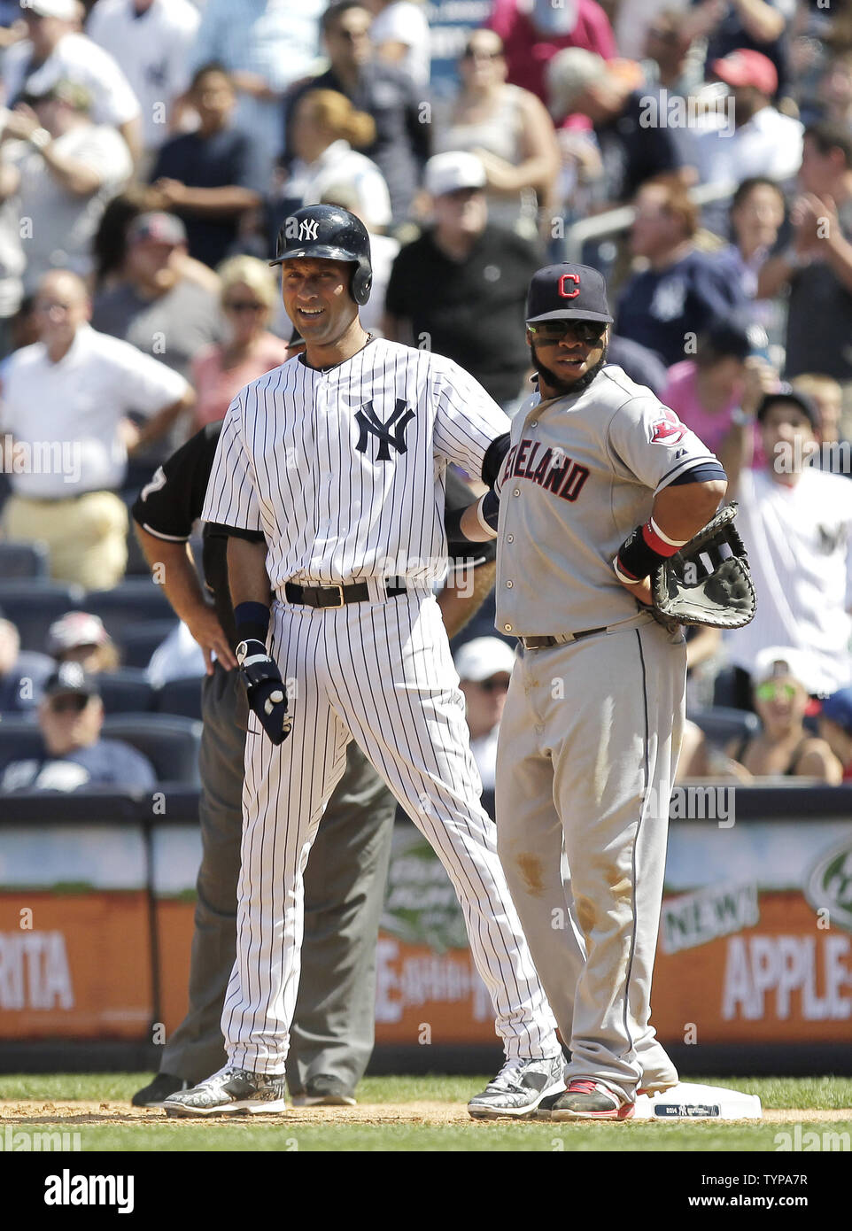 New York Yankees' Derek Jeter hits a single in the fourth inning