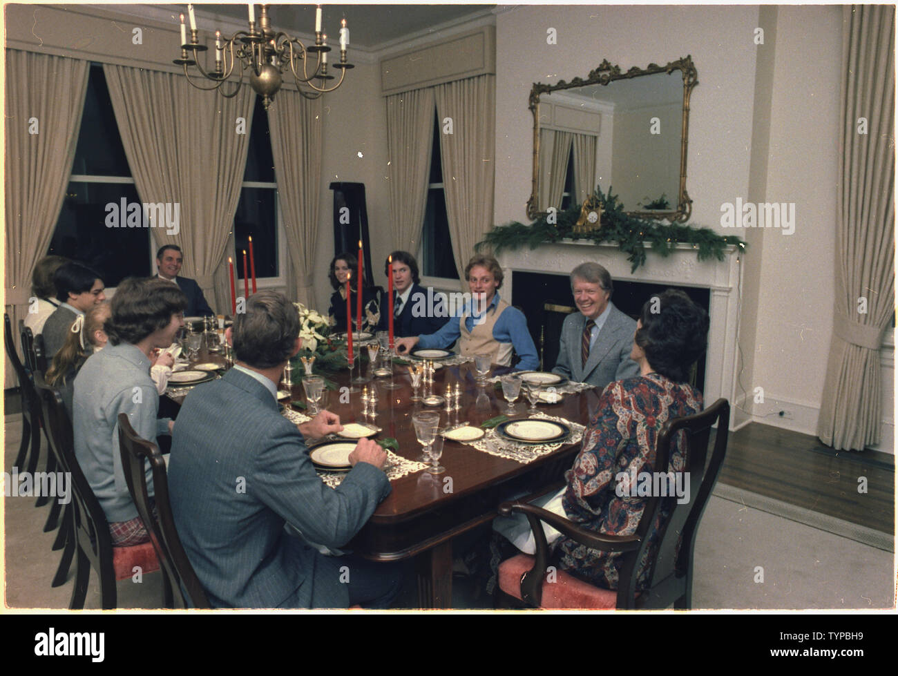 Walter Mondale hosts a dinner party for Jimmy Carter and family. Stock Photo