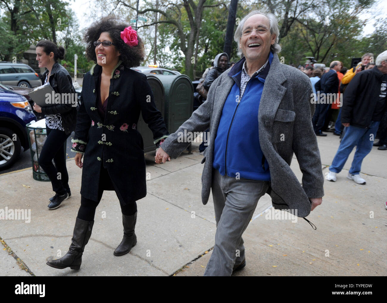 Robert Klein walks on the street at the George Carlin Way Unveiling Ceremony in New York City on October 22, 2014. During a special ceremony Wednesday afternoon, a sign went up on the block naming it 'George Carlin Way'.  The late comedian grew up on West 121st Street between Broadway and Amsterdam in Morningside Heights.       UPI/Dennis Van Tine Stock Photo
