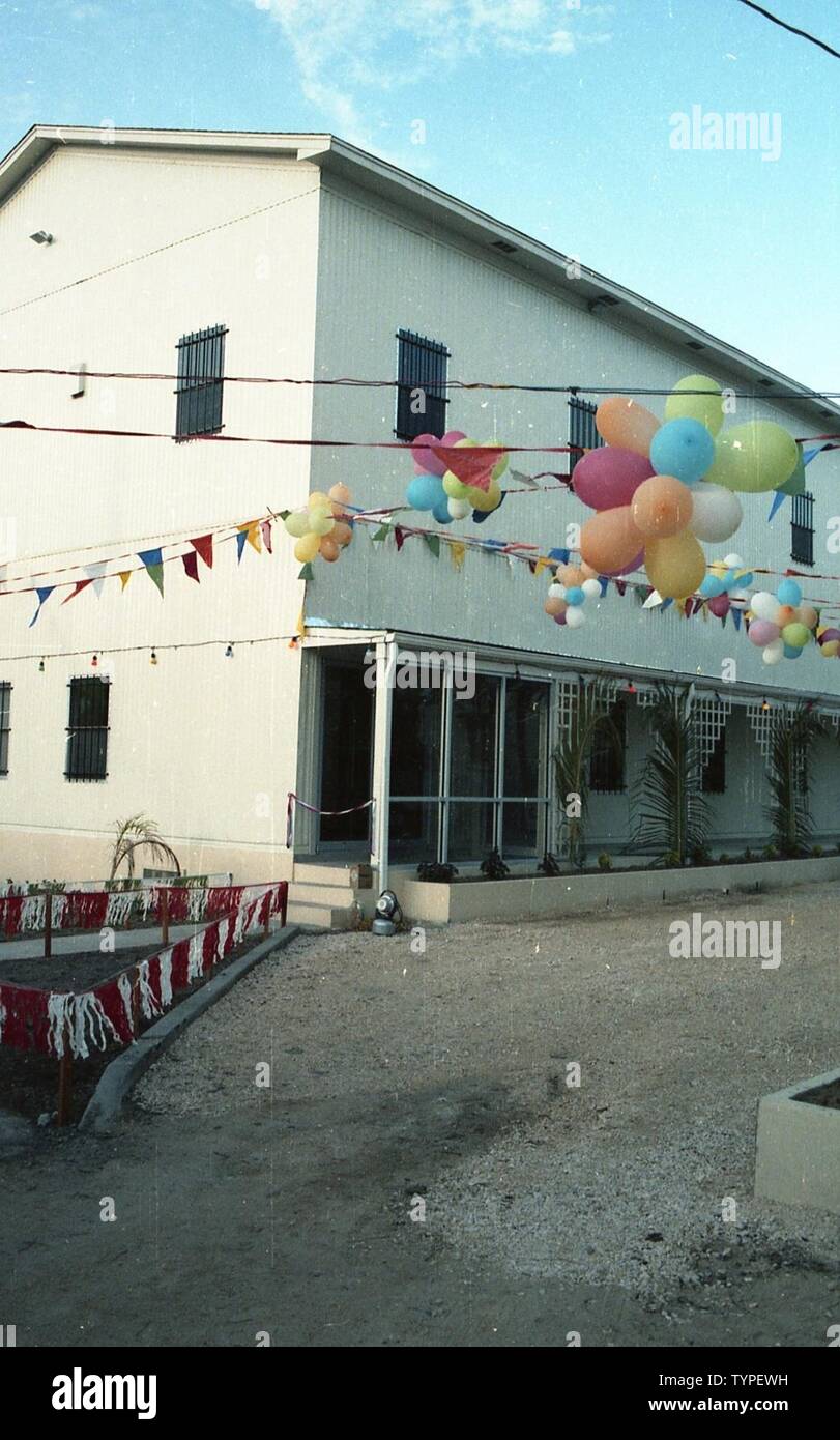 View Of Corner Outside Of Building With Outside Decorations Of