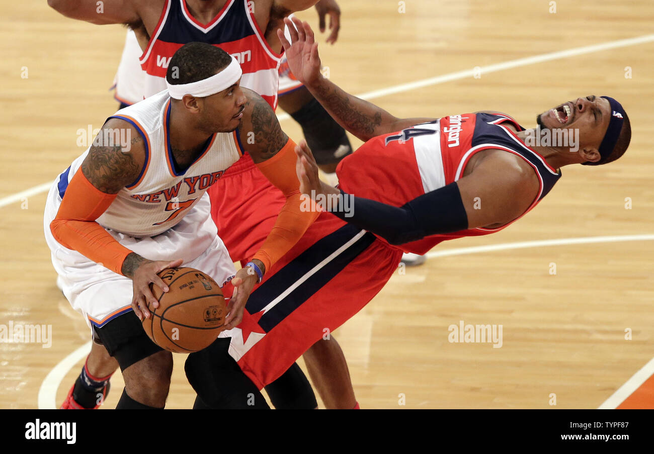 New York Knicks Carmelo Anthony drives into Washington Wizards Paul Pierce in the first quarter at Madison Square Garden in New York City on November 4, 2014.   UPI/John Angelillo Stock Photo