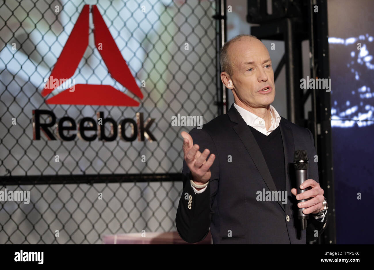 Reebok President Matt O'Toole speaks on stage at a press conference when  Reebok and UFC Announce Long-Term Partnership at Industria Studios in New  York City on December 2, 2014. The UFC announced
