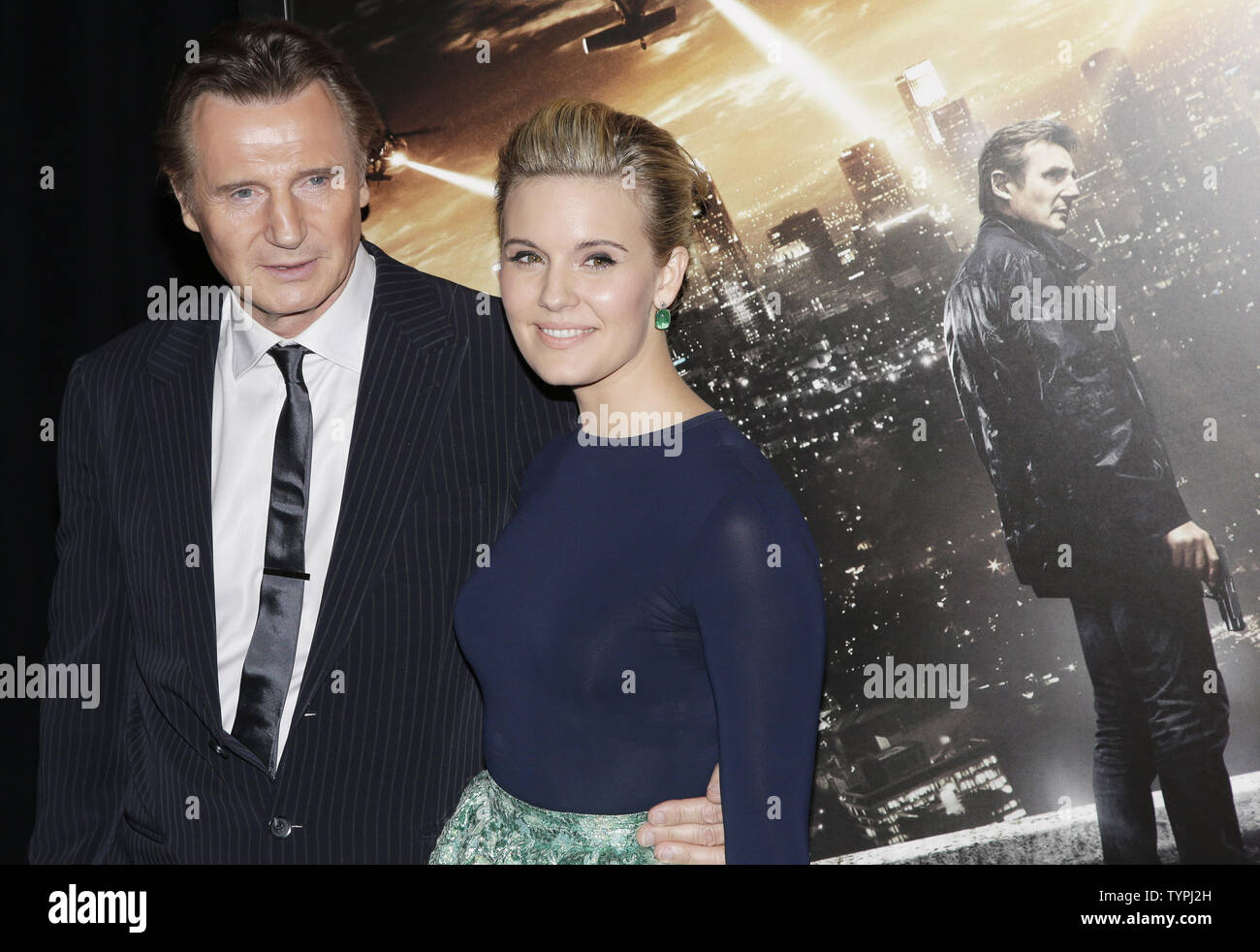 Liam Neeson and Maggie Grace arrive on the red carpet at the 'Taken 3' Fan Event Screening at AMC Empire 25 Theater in New York City on January 7, 2015.    Photo by John Angelillo/UPI Stock Photo