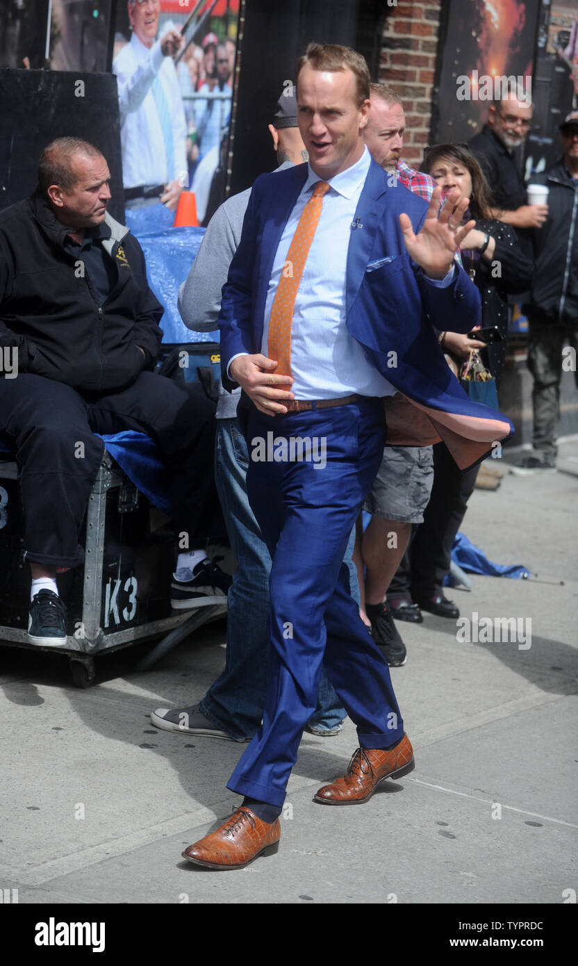 Peyton Manning arrives at the backstage entrance before the final taping of the 'Late Show,' with David Letterman at The Ed Sullivan Theater in New York City on May 20, 2015. Letterman taped his farewell episode of 'The Late Show' on Wednesday afternoon, then walked backstage as the Foo Fighters closed out the show with a performance of 'Everlong.'       Photo by Dennis Van Tine/UPI Stock Photo