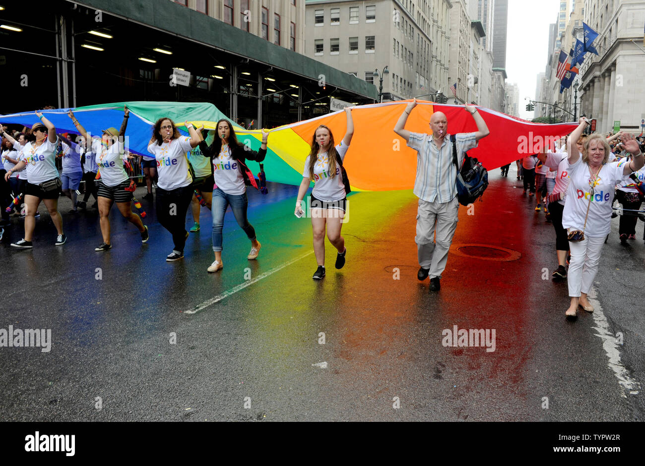 Participants march carrying a giant Rainbow Flag at the 2015 NYC Gay Pride March in New York City on June 28, 2015. The parade comes 2 days after the US Supreme Court rules gay marriage is legal nationwide The ruling, which sparked celebrations outside the court in Washington DC, brings to an end more than a decade of bitter legal battles.       Photo by Dennis Van Tine/UPI Stock Photo