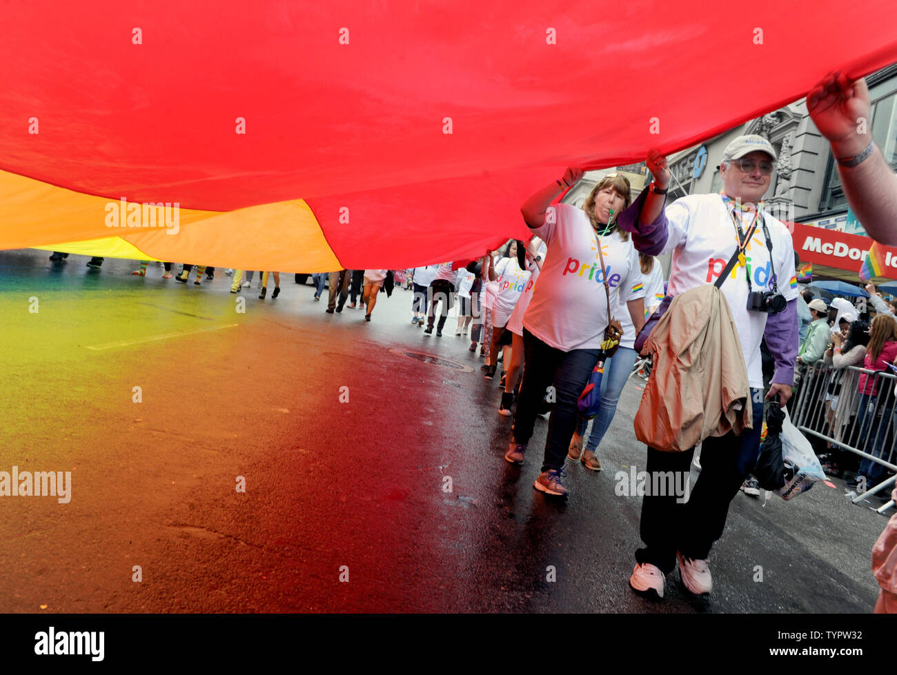 Participants march carrying a giant Rainbow Flag at the 2015 NYC Gay Pride March in New York City on June 28, 2015. The parade comes 2 days after the US Supreme Court rules gay marriage is legal nationwide The ruling, which sparked celebrations outside the court in Washington DC, brings to an end more than a decade of bitter legal battles.       Photo by Dennis Van Tine/UPI Stock Photo