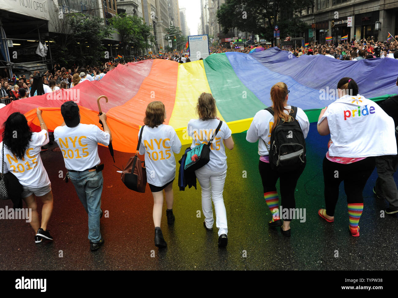 Participants march carrying a giant Rainbow Flag at the 2015 NYC Gay Pride March in New York City on June 28, 2015. The parade comes 2 days after the US Supreme Court rules gay marriage is legal nationwide The ruling, which sparked celebrations outside the court in Washington DC, brings to an end more than a decade of bitter legal battles.       Photo by Dennis Van Tine/UPI Stock Photo
