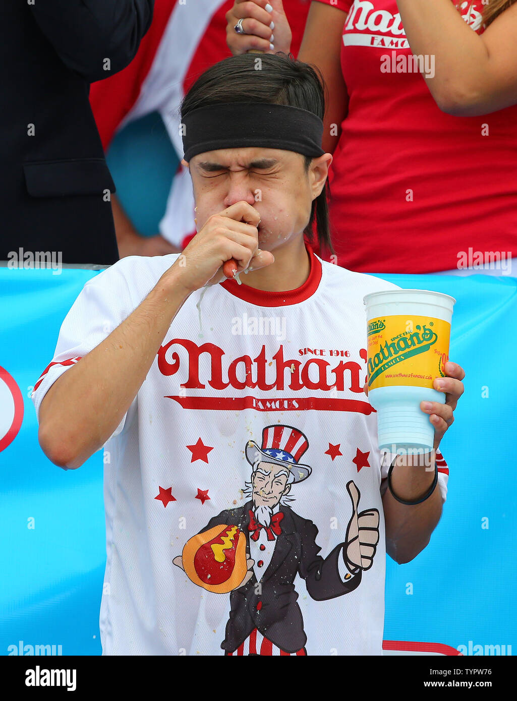 Matt Stonie competes at the Nathan's Famous Fourth of July International Hot  Dog Eating Contest in Coney Island, NY on July 4, 2015. The Nathan's Famous  Fourth of July International Hot Dog