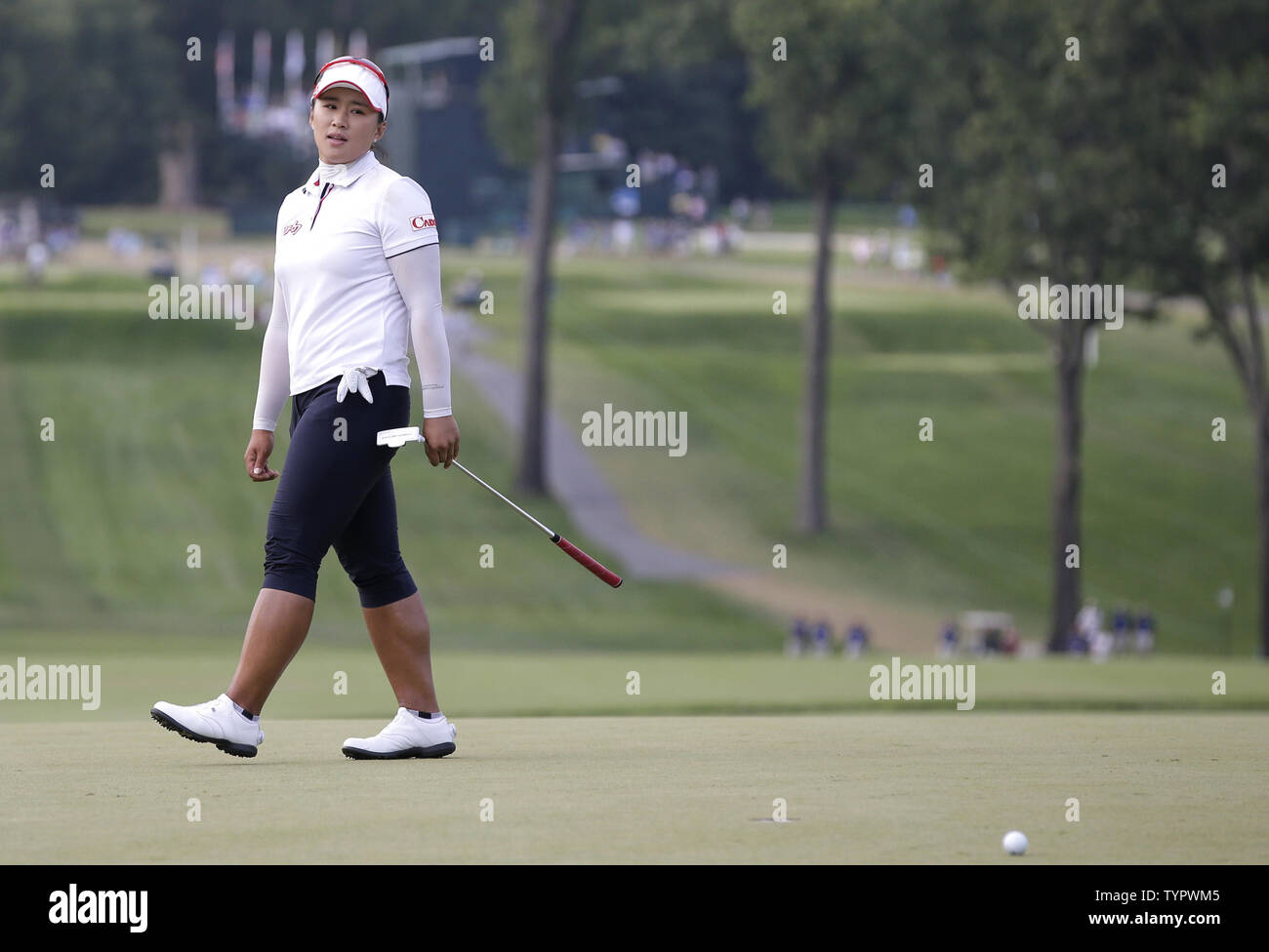 Amy Yang of Korea reacts reacts after missing a putt for par to send the championship to a playoff on the 18th green in the final round of the LPGA U.S. Women's Open Championship at Lancaster Country Club in Lancaster, PA on July 12, 2015. In Gee Chun of Korea wins the U.S. Women's Open and her first LPGA major championship with a score of 8 under par.     Photo by John Angelillo/UPI Stock Photo