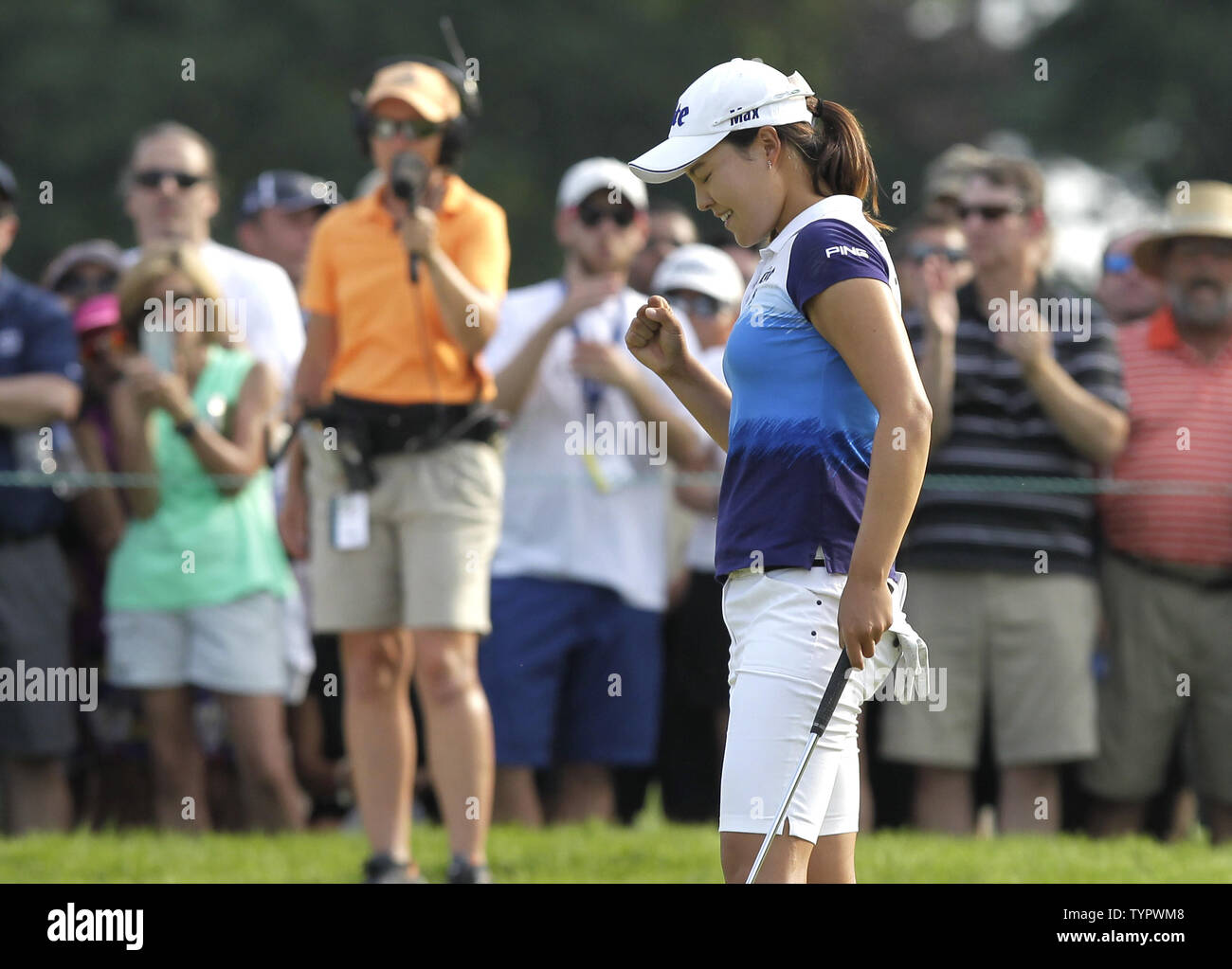In Gee Chun of Korea celebrates after making a birdie putt on the 17th green in the final round of the LPGA U.S. Women's Open Championship at Lancaster Country Club in Lancaster, PA on July 12, 2015. Chun wins the U.S. Women's Open and her first LPGA major championship with a score of 8 under par.     Photo by John Angelillo/UPI Stock Photo