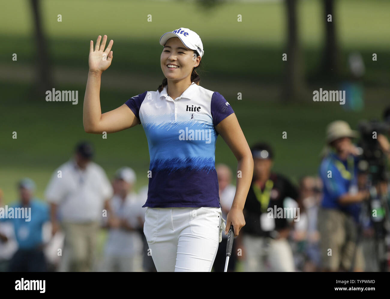 In Gee Chun of Korea smiles as she walks off of the 16th green after making a birdie putt in the final round of the LPGA U.S. Women's Open Championship at Lancaster Country Club in Lancaster, PA on July 12, 2015. Chun wins the U.S. Women's Open and her first LPGA major championship with a score of 8 under par.     Photo by John Angelillo/UPI Stock Photo
