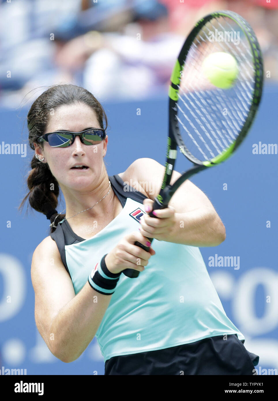 Jamie Loeb hits a backhand to Caroline Wozniacki of Denmark in their first round match in Arthur Ashe Stadium on day two at the US Open Tennis Championships at the USTA Billie Jean King National Tennis Center in New York City on September 1, 2015.      Photo by John Angelillo/UPI Stock Photo