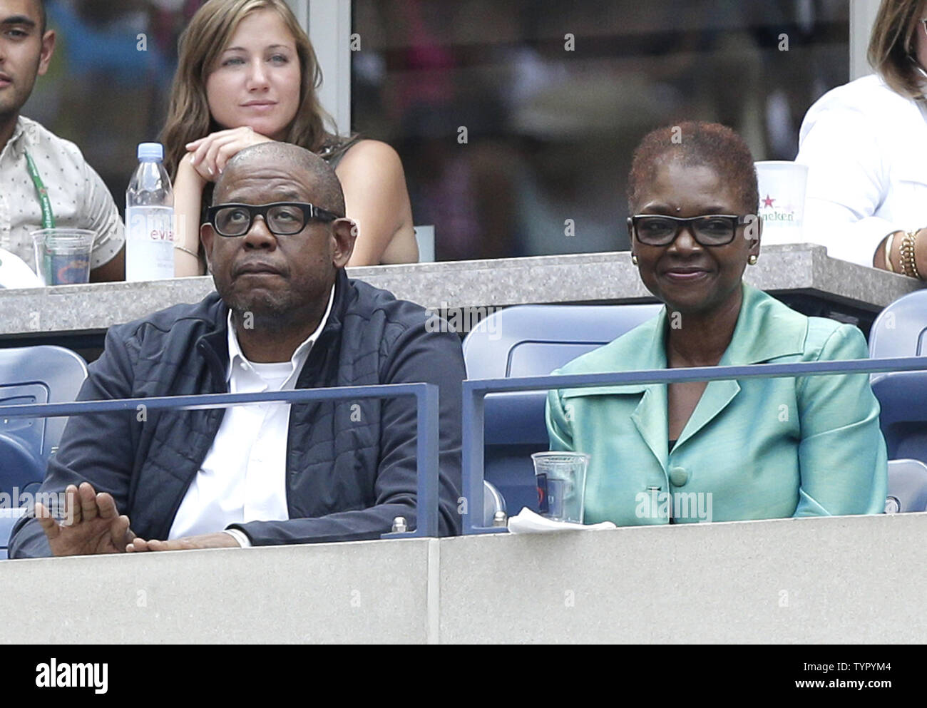 Forest Whitaker watches Caroline Wozniacki of Denmark play Jamie Loeb in their first round match in Arthur Ashe Stadium on day two at the US Open Tennis Championships at the USTA Billie Jean King National Tennis Center in New York City on September 1, 2015.      Photo by John Angelillo/UPI Stock Photo