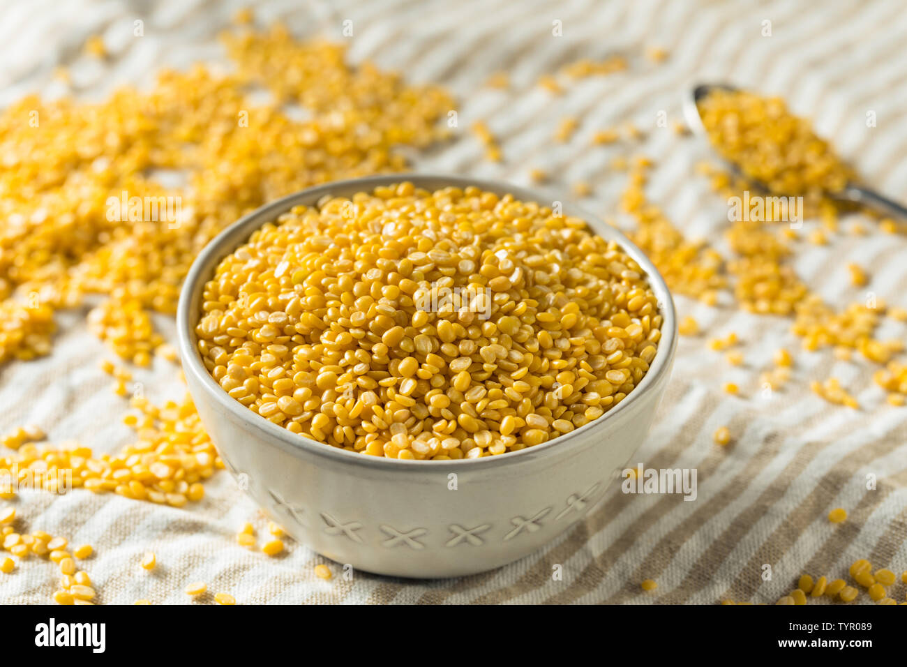 Dried Organic Moong Dal Split Mung Beans in a Bowl Stock Photo