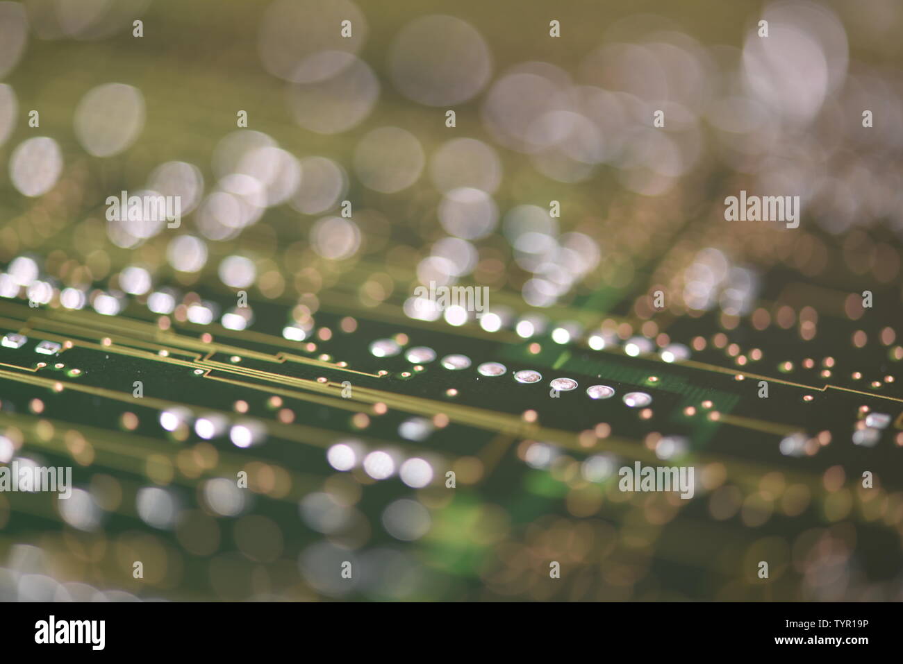 Closeup of electronic circuit board with selective focus Stock Photo