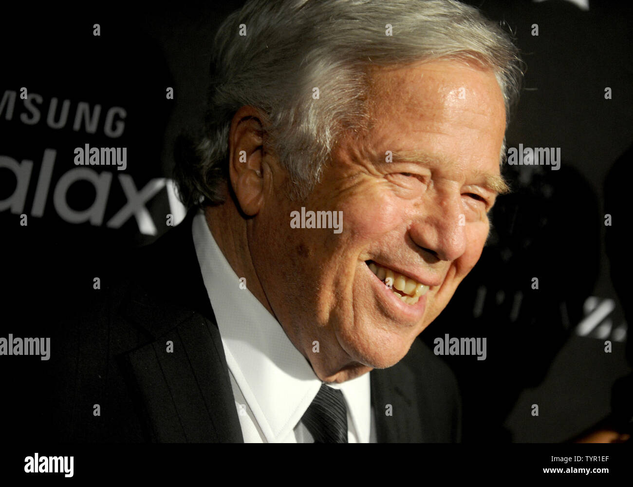 Robert Kraft arrives on the red carpet at the Harper’s BAZAAR ICONS