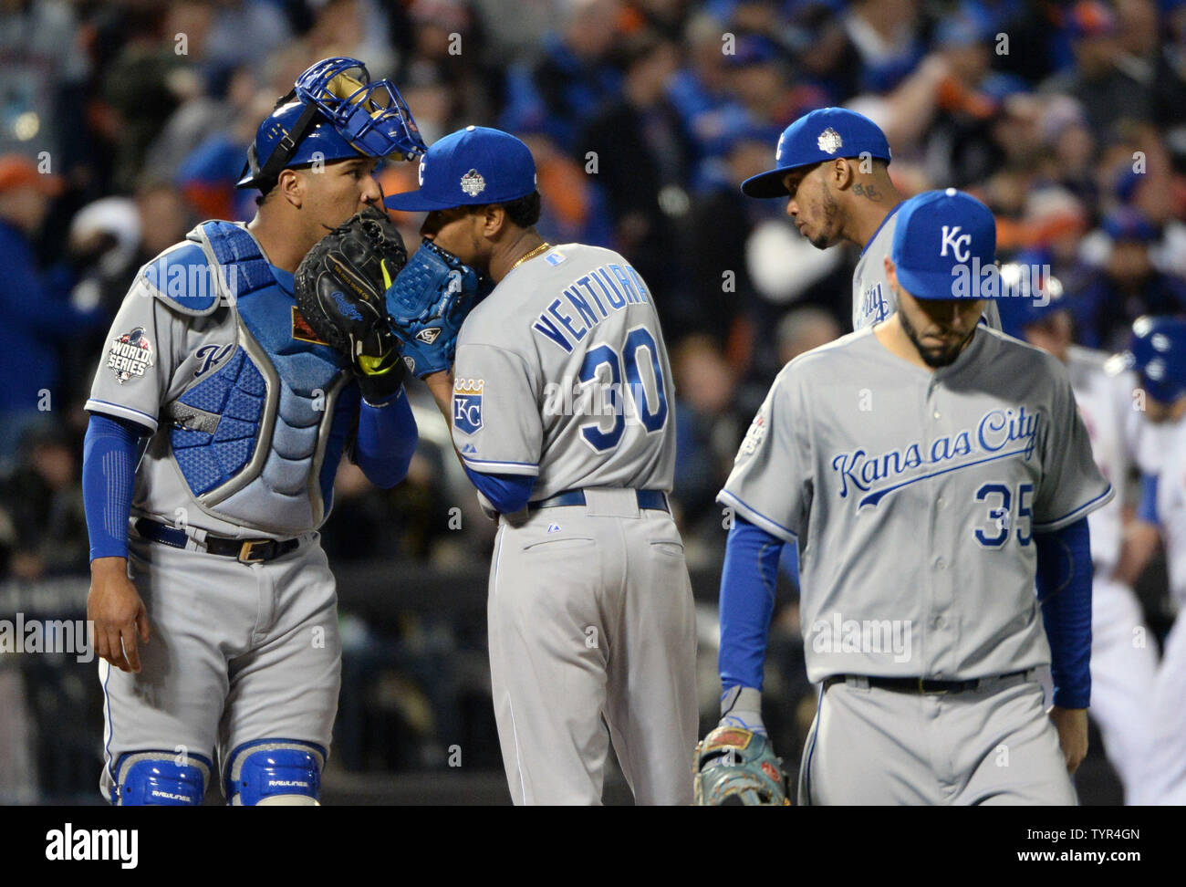 Kansas City Royals pitcher Yordano Ventura (30) talks with catcher Salvador  Perez in the fourth inning against the New York Mets in game 3 of the World  Series at Citi Field in