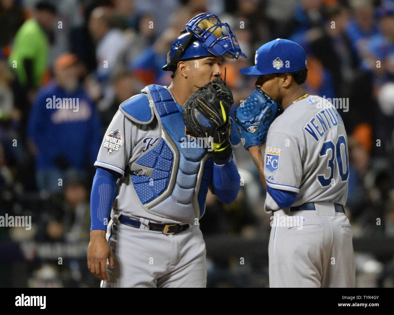 Kansas City Royals pitcher Yordano Ventura (30) talks with catcher Salvador  Perez in the fourth inning against the New York Mets in game 3 of the World  Series at Citi Field in