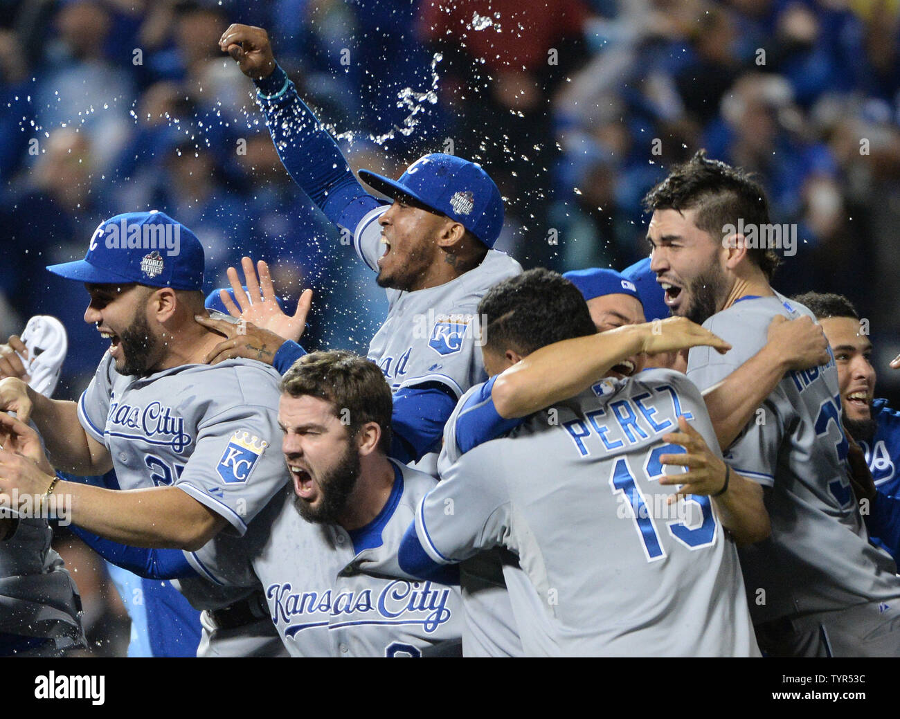 Members of the Kansas City Royals celebrate as they win the World