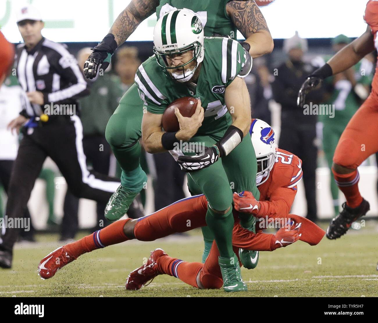 Buffalo Bills Leodis McKelvin tackles New York Jets quarterback Ryan Fitzpatrick in the second half at MetLife Stadium in East Rutherford, New Jersey on November 12, 2015.  The Bills defeated the Jets 22-17.  Photo by John Angelillo/UPI Stock Photo