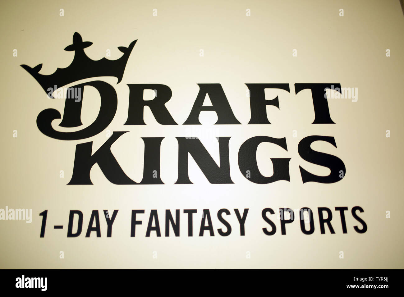 A DraftKings logo is displayed in New York City on November 13, 2015. Daily fantasy giants DraftKings and FanDuel each filed a lawsuit Friday in New York State Supreme Court in Manhattan to try to stop New York Attorney General Eric Schneiderman from carrying out his threat to ban daily fantasy games from New York state.   Photo by John Angelillo/UPI Stock Photo