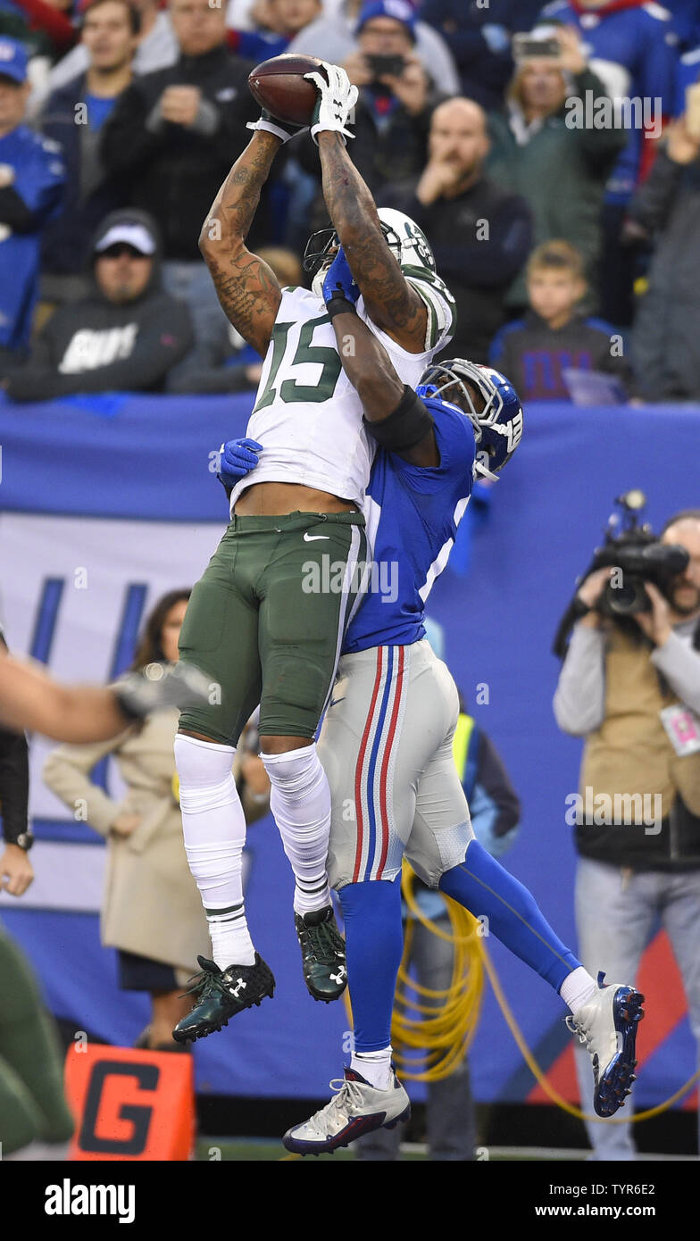 New York Jets wide receiver Brandon Marshall (15) makes 9 yard touchdown  catch reception in the 4th quarter against the New York Giants at MetLife  Stadium in East Rutherford, New Jersey on