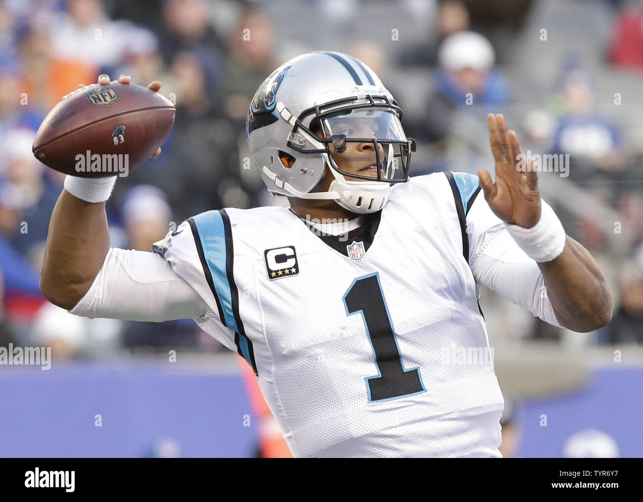 Carolina Panthers Cam Newton throws a pass in the second half against the New  York Giants at MetLife Stadium in East Rutherford, New Jersey on December  20, 2015. The Panthers defeated the
