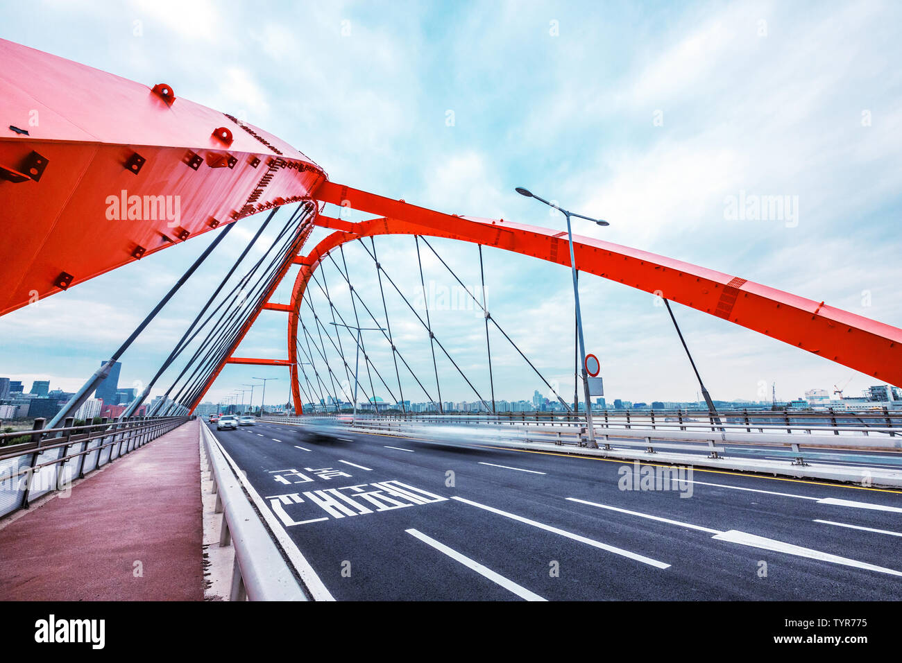 bridge with abstract steel constructions in seoul in cloud sky Stock Photo