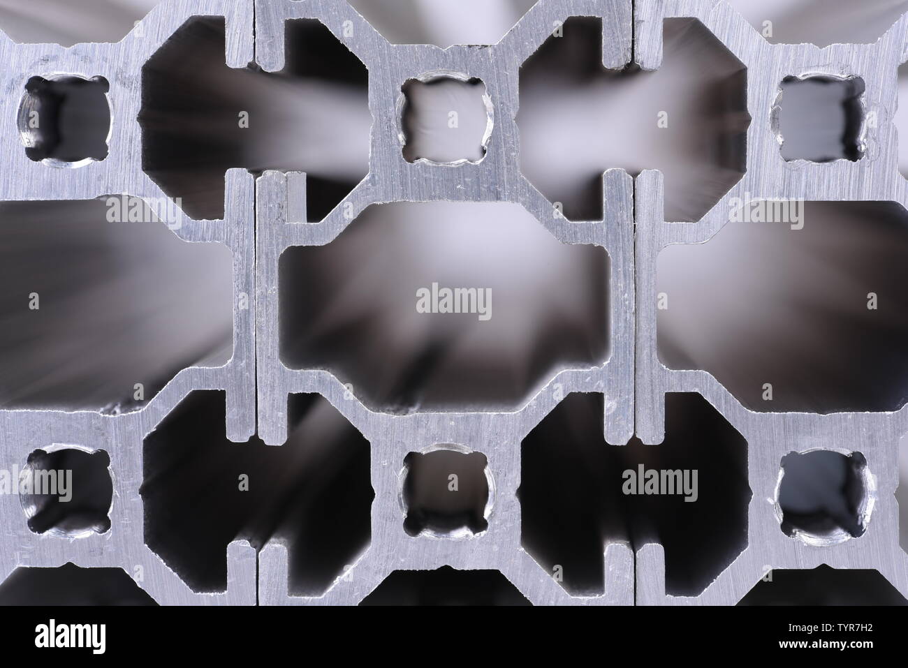 Cross sections of aluminum profile close-up front view Stock Photo