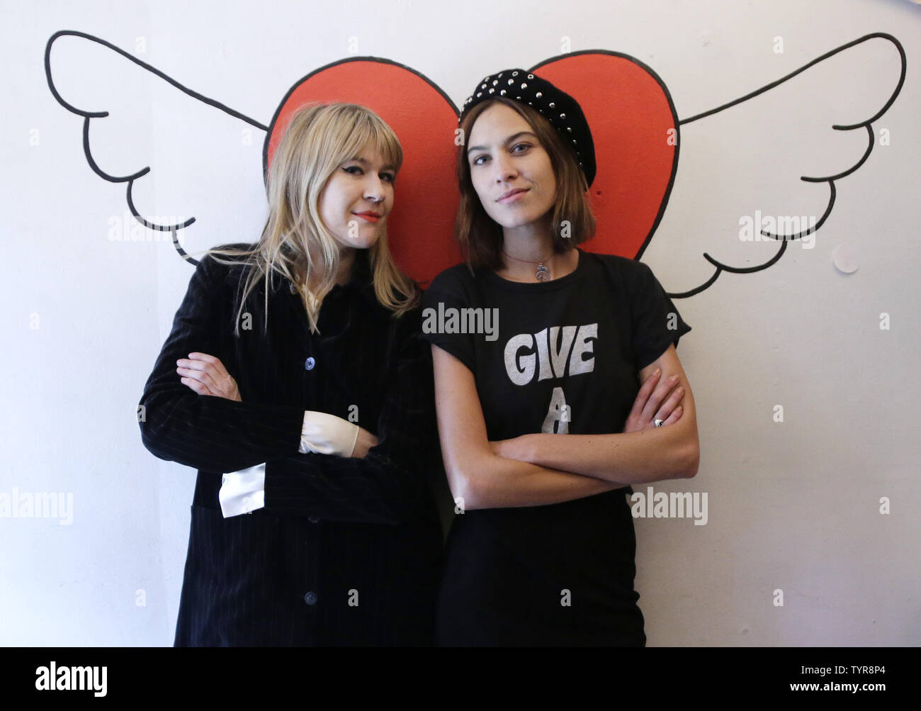 Alexa Chung and Tennessee Thomas stand together when they launch Tennessee Thomas's first collection at her store The Deep End Club during Fall 2016 New York Fashion Week on February 14, 2016 in New York City.  Photo by John Angelillo/UPI Stock Photo