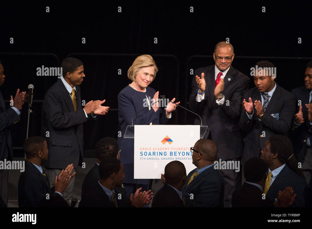 Former Secretary of State and current Democratic Presidential candidate Hillary Clinton applauds students at the Eagle Academy Foundation's annual fundraising breakfast titled ÒSoaring BeyondÓ on April 29, 2016 at Gotham Hall in New York City.   Photo by Bryan R. Smith/UPI Stock Photo
