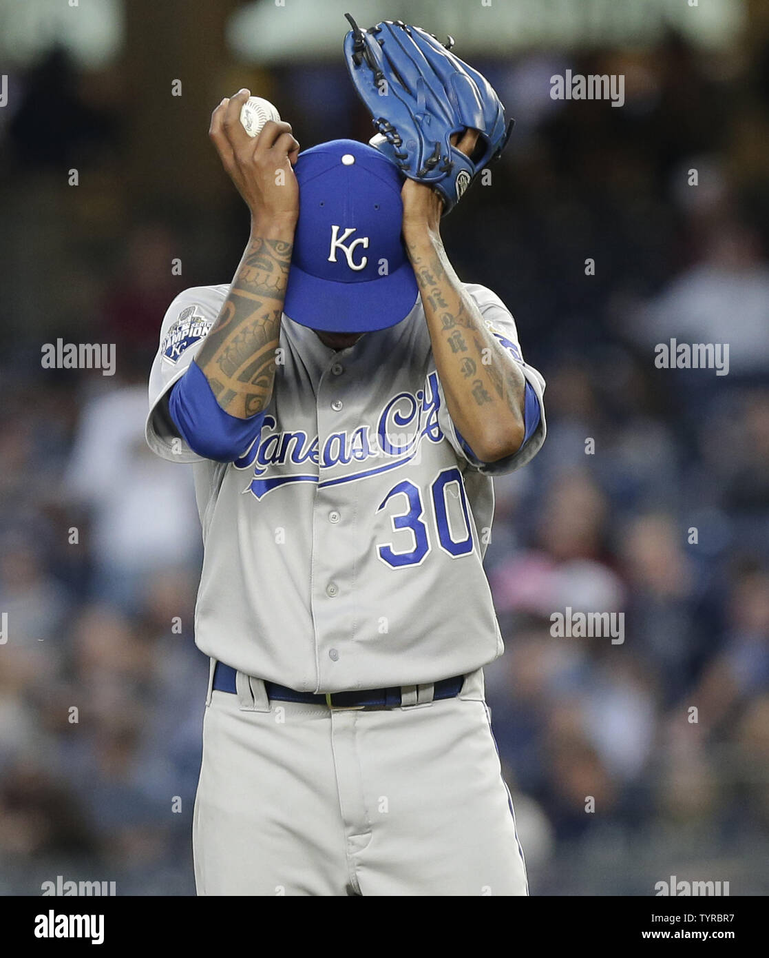 Kansas City Royals starting pitcher Yordano Ventura adjusted his