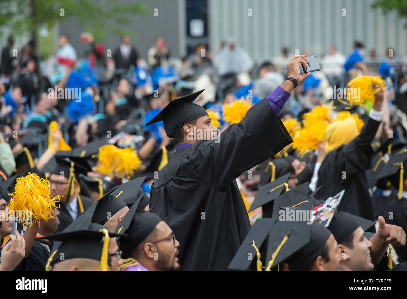 Students celebrate before First Lady Michelle Obama delivers her final commencement address as First Lady at the 170th Commencement Ceremony of The City College of New York on the CCNY campus in historic Harlem, Friday, June 3, 2016. More than 3,000 students make up the Class of 2016.  Photo by Bryan R. Smith/UPI Stock Photo