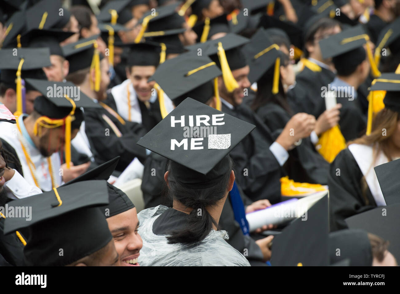 A student with a message on his mortar board looks on before First Lady Michelle Obama delivers her final commencement address as First Lady at the 170th Commencement Ceremony of The City College of New York on the CCNY campus in historic Harlem, Friday, June 3, 2016. More than 3,000 students make up the Class of 2016.  Photo by Bryan R. Smith/UPI Stock Photo