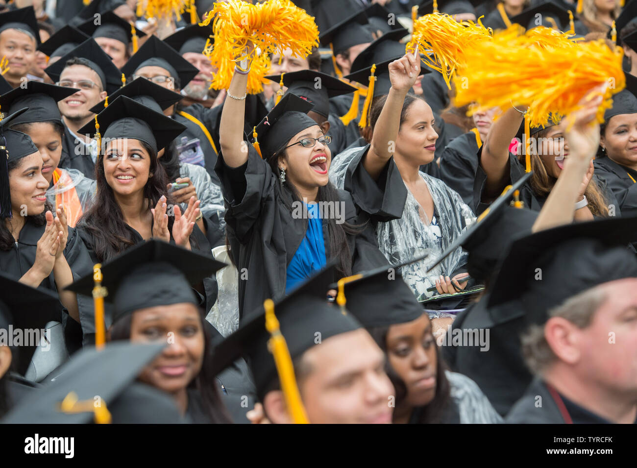 Students celebrate before First Lady Michelle Obama delivers her final commencement address as First Lady at the 170th Commencement Ceremony of The City College of New York on the CCNY campus in historic Harlem, Friday, June 3, 2016. More than 3,000 students make up the Class of 2016.  Photo by Bryan R. Smith/UPI Stock Photo