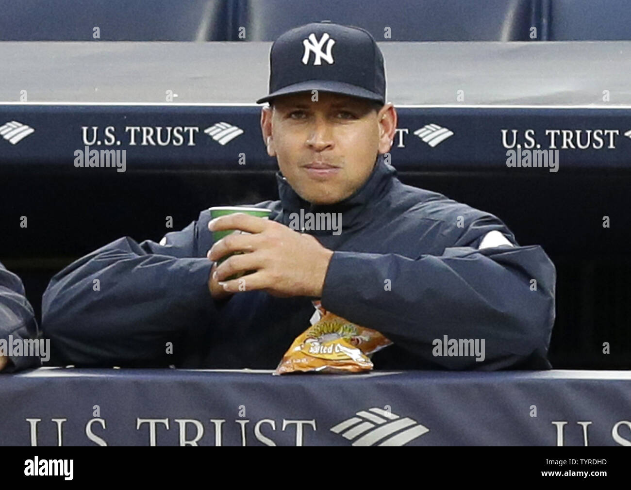 New York Yankees Alex Rodriguez watches the game from the dug out in ...