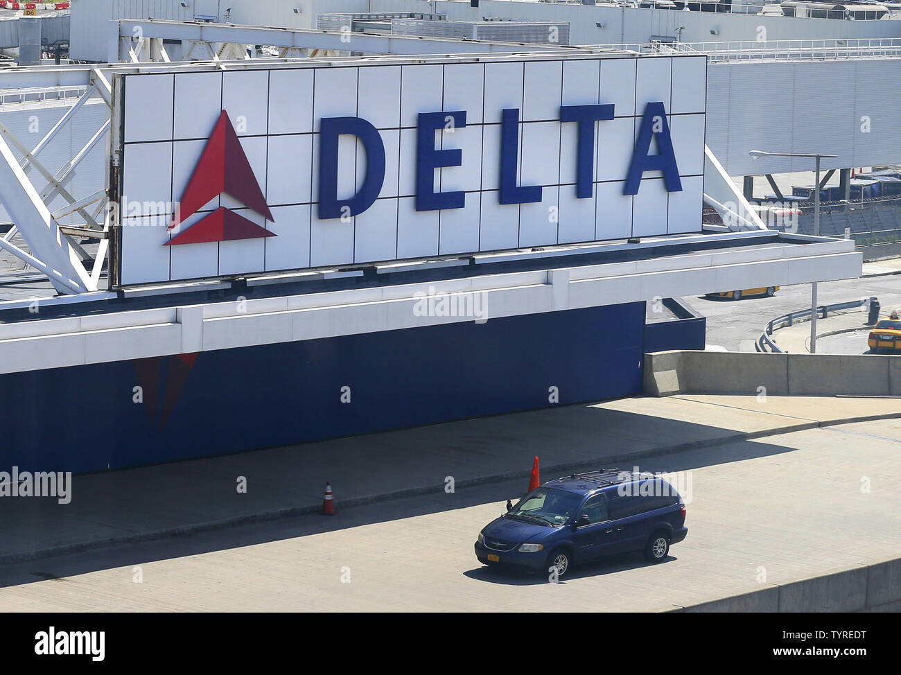 A Delta Airlines sign hangs at a terminal at LaGuardia Airport in New York City on August 8, 2016 in New York City. Delta began to resume flights but still expect massive cancelations and delays after after a computer glitch shut down the airline completely this morning.    Photo by John Angelillo/UPI Stock Photo