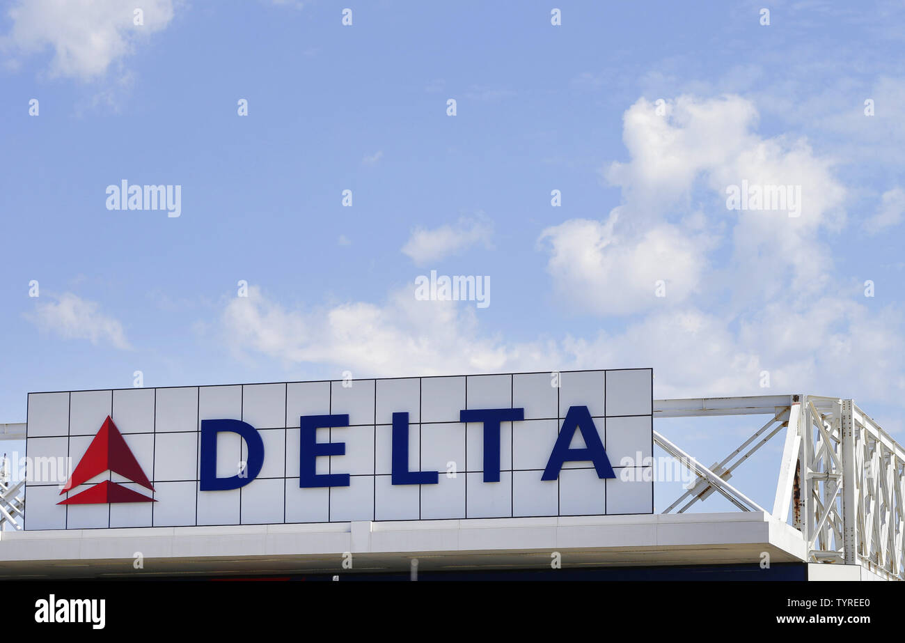 A Delta Airlines sign hangs at a terminal at LaGuardia Airport in New York City on August 8, 2016 in New York City. Delta began to resume flights but still expect massive cancelations and delays after after a computer glitch shut down the airline completely this morning.    Photo by John Angelillo/UPI Stock Photo