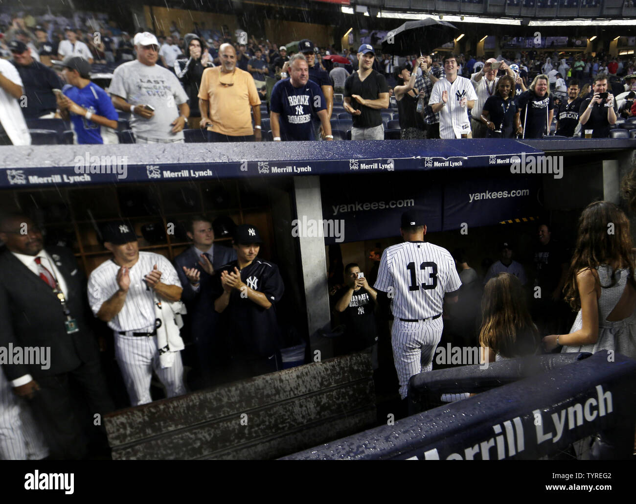 New York Yankees Alex Rodriguez walks through the dugout to the clubhouse  after a retirement ceremony in what is to be his final game in the MLB  against the Tampa Bay Rays