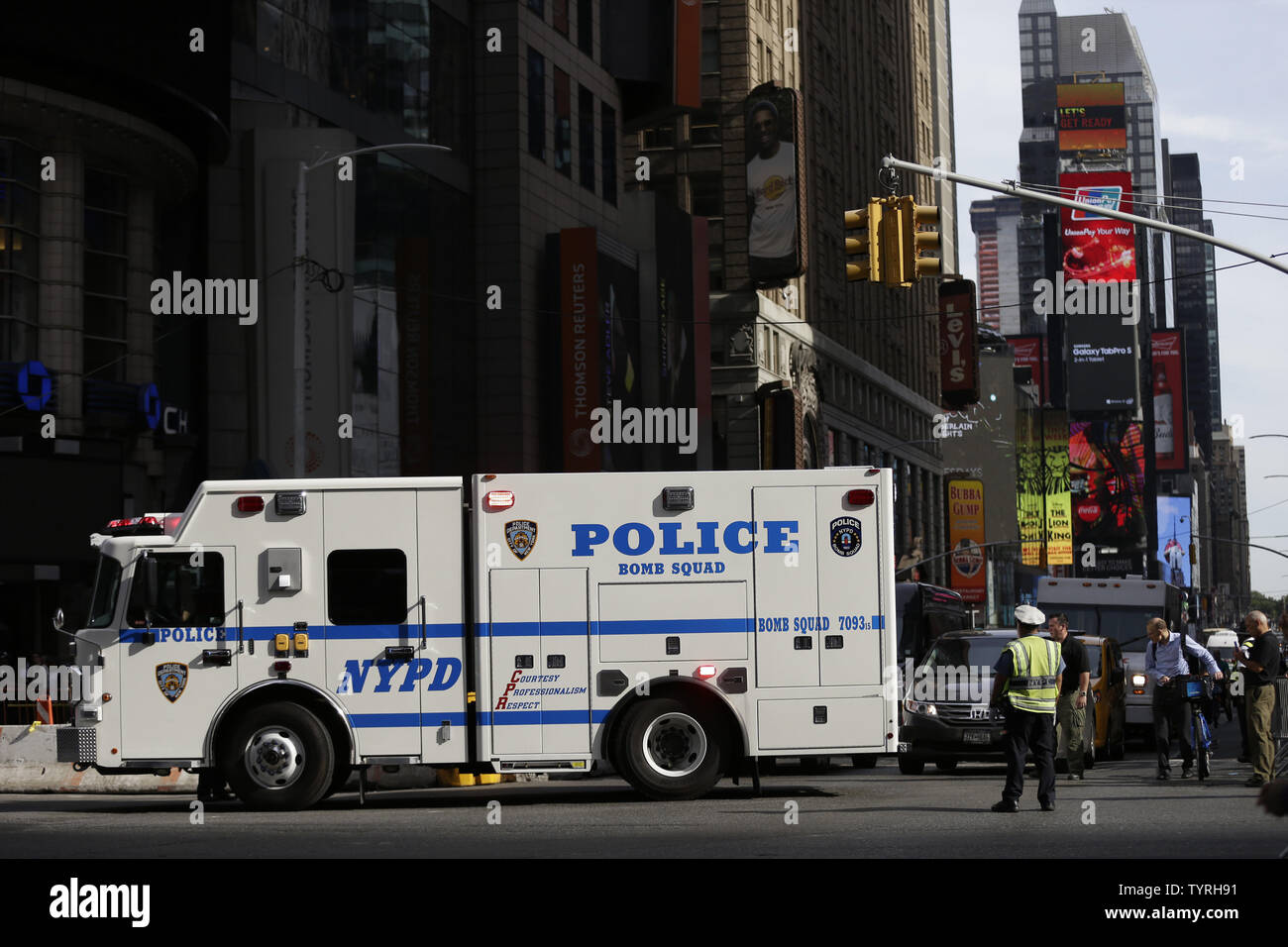 An NYPD bomb squad truck moves in Times Square after reports of a suspicious package sent police to the scene on September 21, 2016 in New York City. The package turned out to be an empty suitcase and the all clear was given shortly after. Tensions are still high days after an explosion from a bomb went off on West 23rd Street in Manhattan on Saturday, injuring 29 people, shattering windows and prompting widespread street closures on West 23rd Street.      Photo by John Angelillo/UPI Stock Photo
