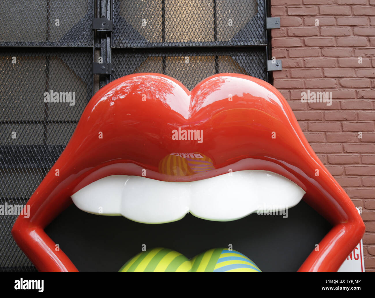 Giant Art Installations Of The Rolling Stones Legendary Tongue Logo Are On Display Outside Of Industria In The West Village Leading Up To The North American Debut Of Exhibitionism The Rolling Stones