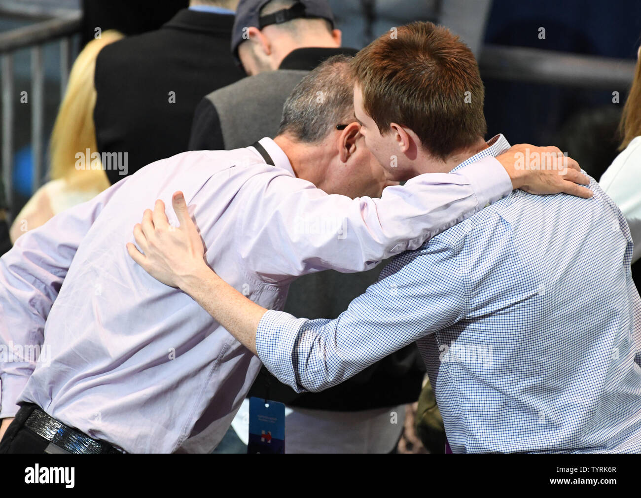 Hillary supporters  console each other as results come in at Democratic presidential candidate Hillary Clinton's election night rally at the Javits Center in New York on November 8, 2016.          Photo by Pat Benic/UPI Stock Photo