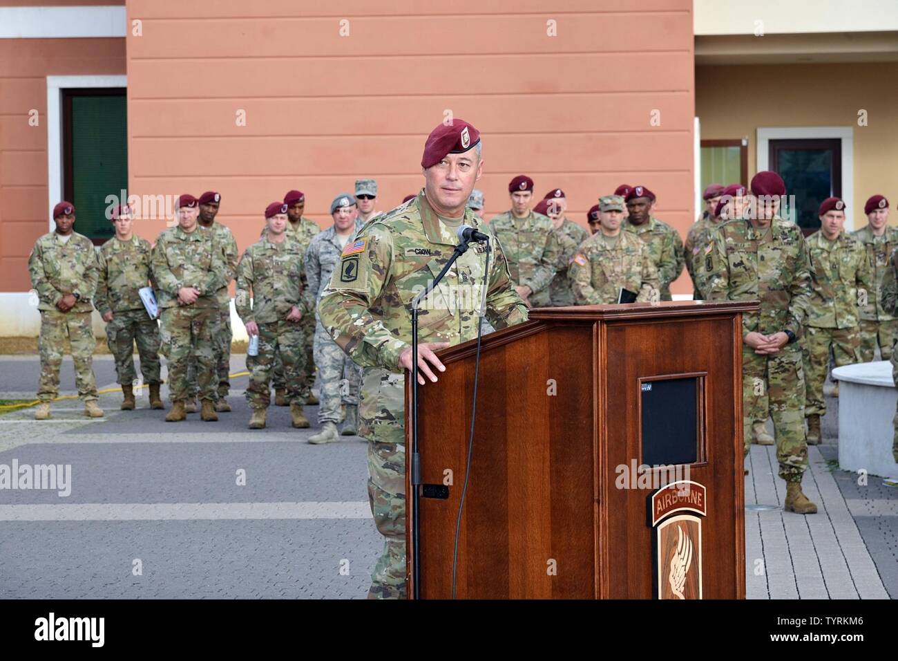 Outgoing Command Sgt. Maj. Travis C. Crow, 54th Brigade Engineer Battalion, gives a speech, Nov. 23, 2016, during a change of responsibility ceremony at Caserma Del Din in Vicenza, Italy.  The 173rd Airborne Brigade based in Vicenza, Italy, is the Army Contingency Response Force in Europe, and is capable of projecting forces to conduct the full of range of military operations across the United State European, Central and Africa Commands areas of responsibility. Stock Photo