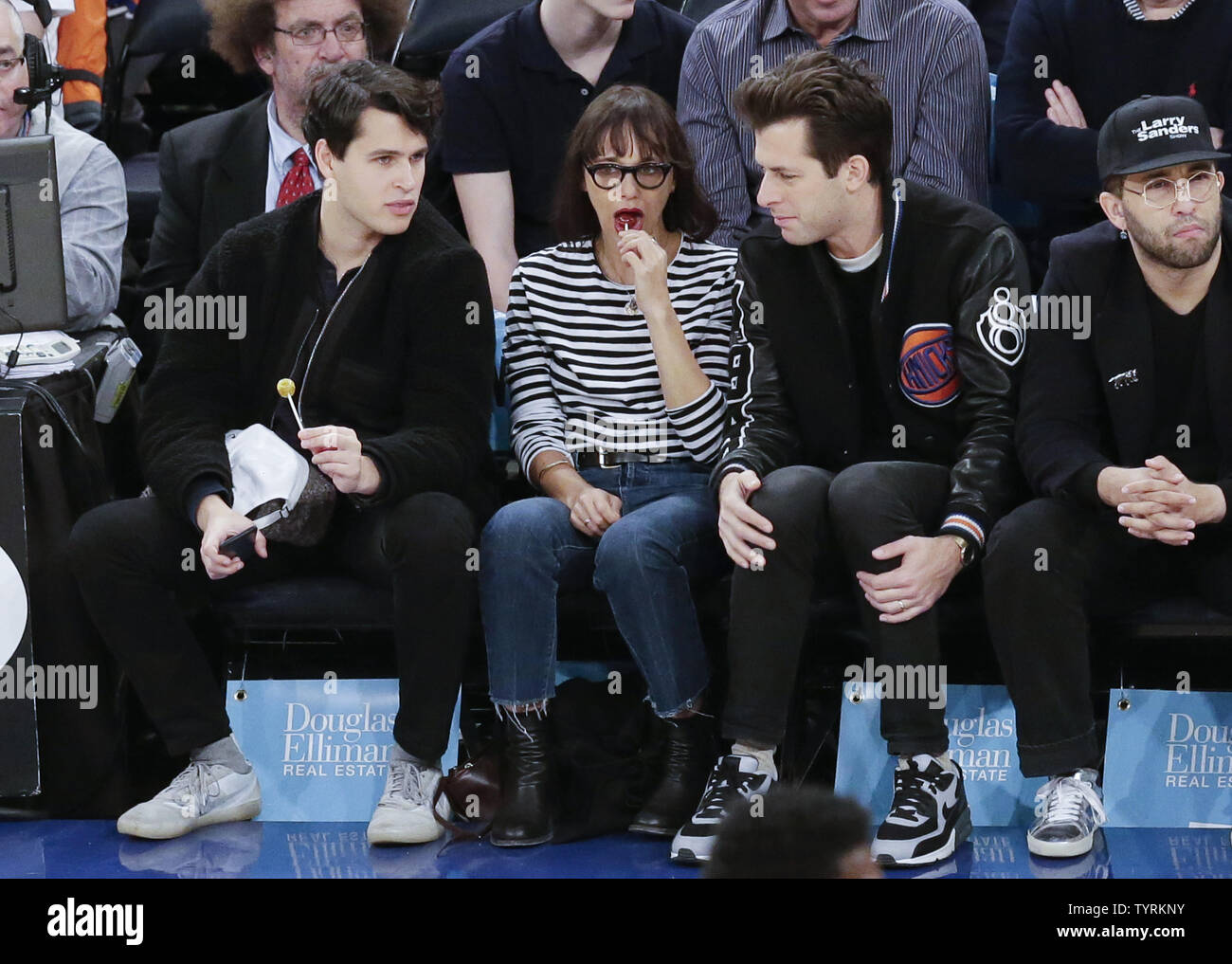 Rashida Jones and Ezra Koenig watch the New York Knicks play the Charlotte  Hornets at Madison