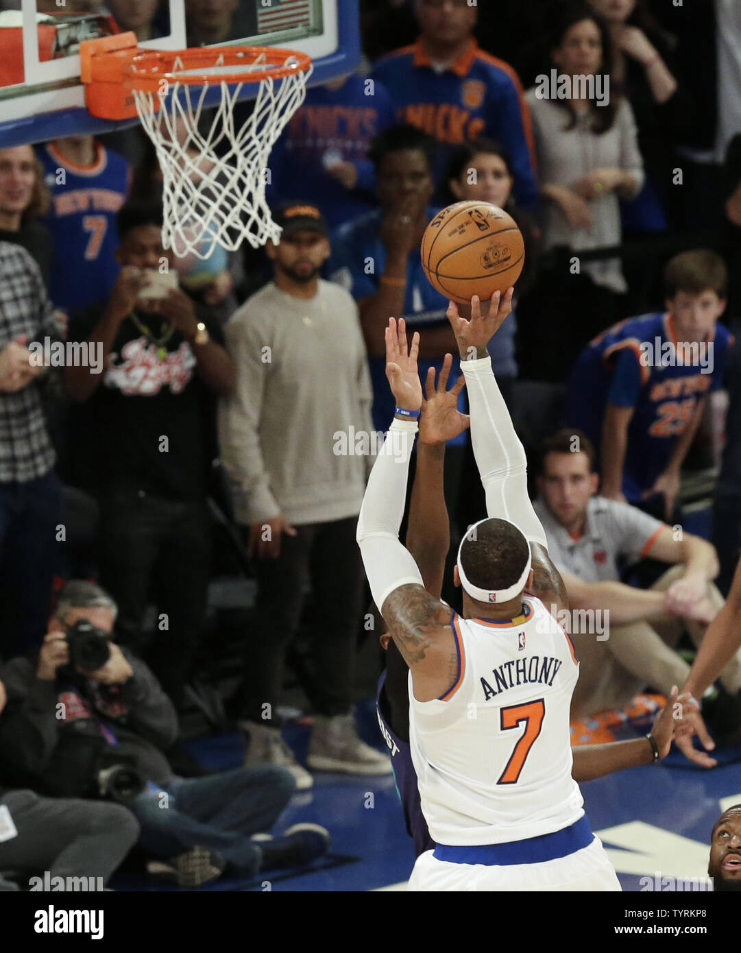 New York Knicks small forward Carmelo Anthony (7) smiles after hitting a  three-point shot during their game against the Washington Wizards played at  the Verizon Center in Washington, D.C., Friday, January 6