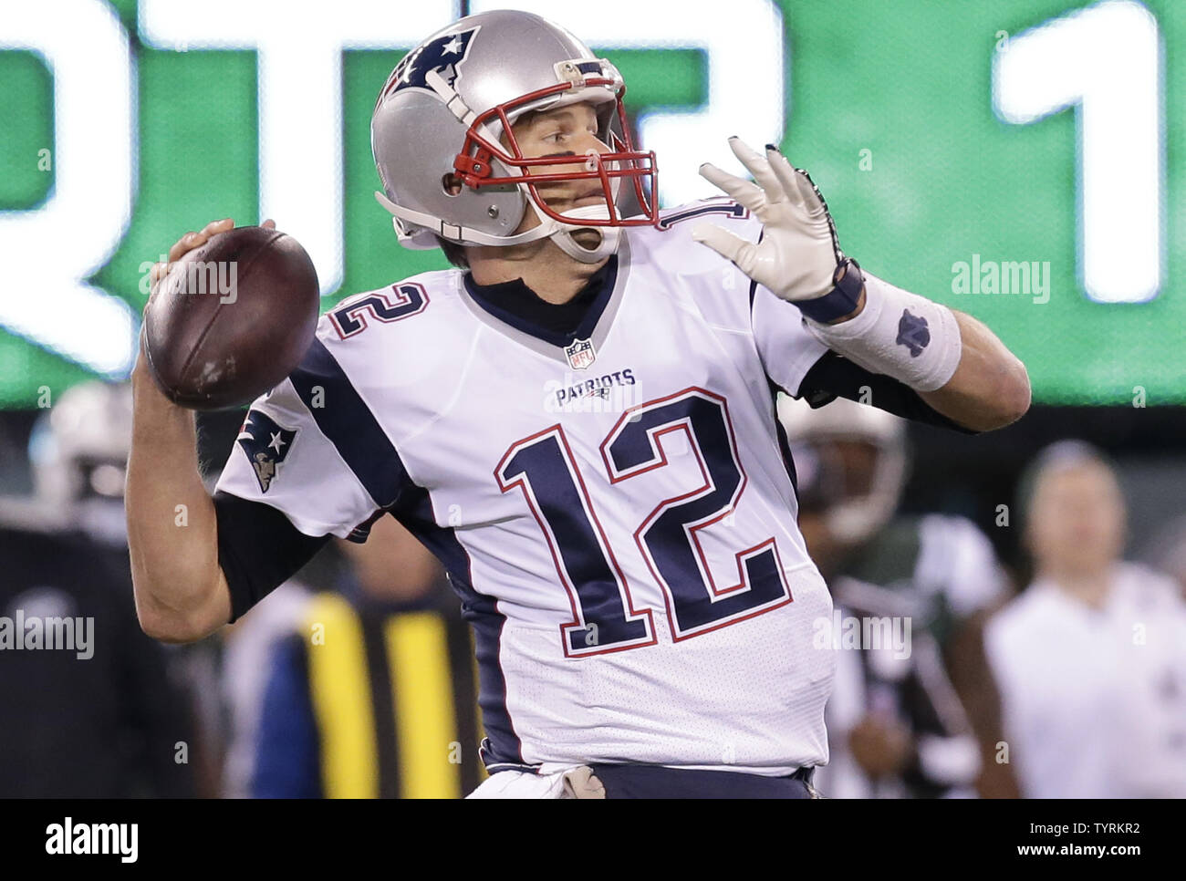 New England Patriots Tom Brady throws a pass in the first half