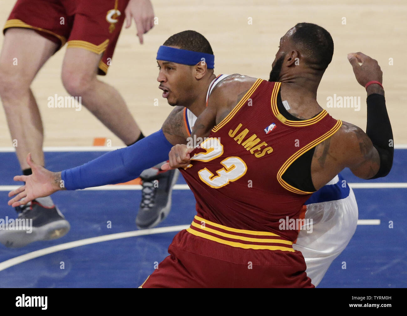 Cleveland Cavaliers LeBron James and New York Knicks Carmelo Anthony battle  for position near the paint in the first half at Madison Square Garden in New  York City on December 7, 2016.